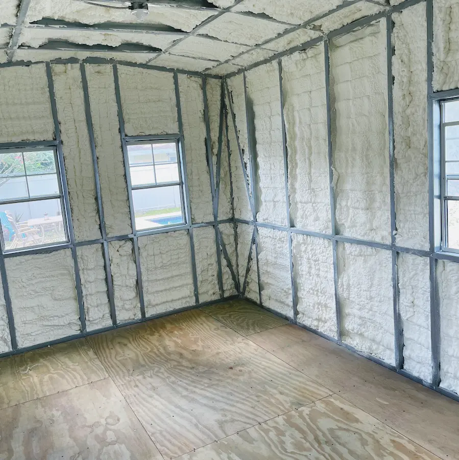Closed-cell spray foam insulation applied to wall cavities in a residential project in Cathedral City
